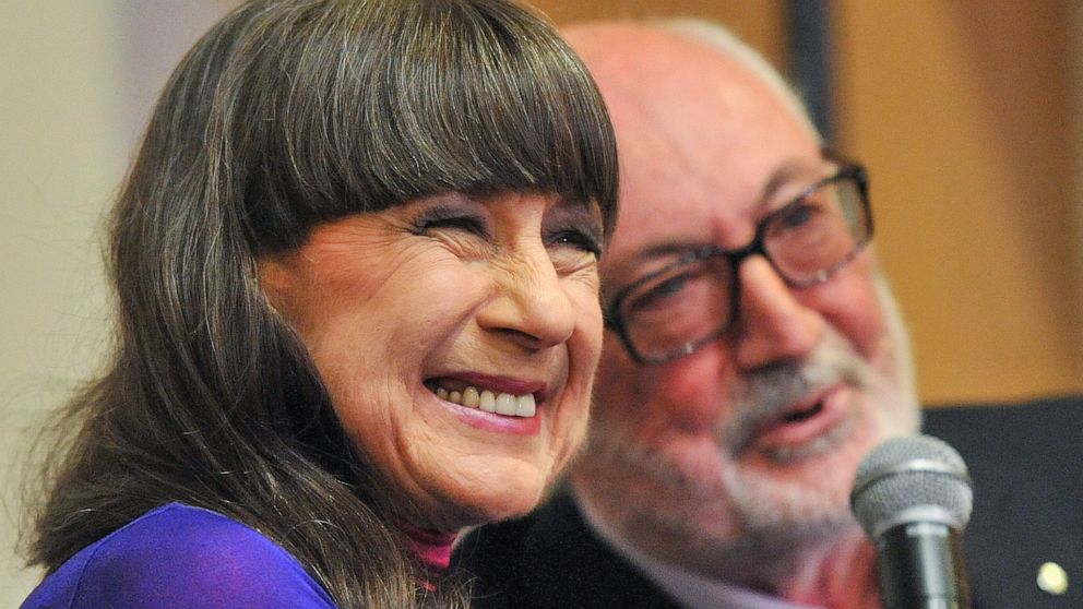 Seekers lead singer Judith Durham with fellow band member and guitarist Athol Guy attends at media conference in Melbourne, Australia on Sept. 10, 2013. Lead singer of The Seekers, Durham, has died aged 79 in Melbourne, Friday, Aug. 5, 2022 after suf