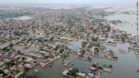 This aerial photo, taken on September 1, 2022, shows flooded residential areas in the town of Dera Allah Yar in Jafarabad district, Balochistan province.