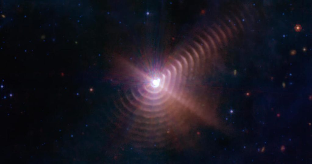 Een paar sterren creëren een 'vingerafdruk' in de afbeelding gemaakt door de James Webb Space Telescope